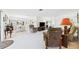 Open-concept living space connects the living and dining areas, offering a versatile and inviting atmosphere at 6948 W Country Club N Dr, Sarasota, FL 34243
