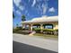 Community pavilion with seating area and views, complemented by manicured landscaping at 4750 Cove Cir # 502, St Petersburg, FL 33708