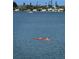 Scenic water view featuring two kayakers enjoying a peaceful day on the water at 4750 Cove Cir # 502, St Petersburg, FL 33708