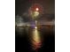 Stunning water view with fireworks overhead and boat lights reflected in the water at 4750 Cove Cir # 502, St Petersburg, FL 33708