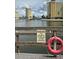 Picturesque waterfront view with multi-story condominiums, and a warning to respect the local manatee population at 4750 Cove Cir # 502, St Petersburg, FL 33708