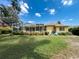 Fenced backyard offers a private outdoor space, perfect for entertaining or relaxing at 1052 Archway Dr, Spring Hill, FL 34608