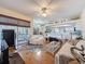 Inviting living room with a unique decor, abundant light, and an open floor plan at 1052 Archway Dr, Spring Hill, FL 34608