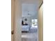 Bedroom featuring carpet floors, a ceiling fan, and sliding glass doors to outdoor area at 536 Boundary Blvd, Rotonda West, FL 33947