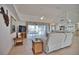 Open living room with tile floors, comfortable seating, and lanai access at 536 Boundary Blvd, Rotonda West, FL 33947
