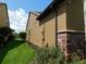 Side view of property showing the building architecture and landscape at 13639 Salinas St, Venice, FL 34293