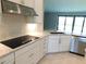 Well-equipped kitchen with granite counters, stainless steel appliances, and open layout at 13639 Salinas St, Venice, FL 34293