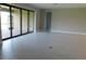 Bright living area with tile floors and sliding doors at 13639 Salinas St, Venice, FL 34293
