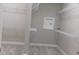 Spacious walk-in closet features ample shelving and plenty of room for organization at 13639 Salinas St, Venice, FL 34293