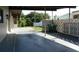 Covered porch with ample space and privacy wall offers a relaxing outdoor experience at 21970 Cellini Ave, Port Charlotte, FL 33952