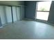 Bright bedroom with a closet, window, and neutral walls, providing a blank canvas at 21970 Cellini Ave, Port Charlotte, FL 33952