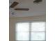 Bright bedroom with natural light, ceiling fan and wood-look flooring at 3536 Harbor Blvd, Port Charlotte, FL 33952