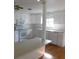 Open kitchen with ample counter space, white cabinetry, and modern appliances at 3536 Harbor Blvd, Port Charlotte, FL 33952