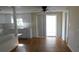 Eat in Kitchen featuring wood flooring and sliding glass doors at 3536 Harbor Blvd, Port Charlotte, FL 33952