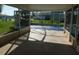Covered patio area with screened enclosure overlooking a pool area at 3536 Harbor Blvd, Port Charlotte, FL 33952