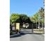 Gated community entrance with a tow-away zone sign at 3433 Dragon View Ct, Valrico, FL 33594