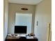 Small home office with a desk, computer, and window with blinds at 3433 Dragon View Ct, Valrico, FL 33594