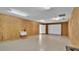 Garage with overhead door and workspace at 6110 Downing St, Dover, FL 33527