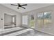 Sunroom with tile floors and access to backyard at 6110 Downing St, Dover, FL 33527