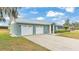 Newly built home with metal roof and two-car garage at 6110 Downing St, Dover, FL 33527