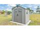 Exterior view of a gray plastic storage shed at 6110 Downing St, Dover, FL 33527