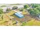 Home on a large lot with a long driveway at 6110 Downing St, Dover, FL 33527
