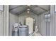 Interior of a shed with water filtration system at 6110 Downing St, Dover, FL 33527