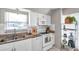 Well-lit kitchen with stainless steel appliances, granite countertops, and ample storage space at 9945 47Th N Ave # 110, St Petersburg, FL 33708