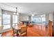 Bright living room featuring hardwood floors, a comfortable sofa, and an open layout at 9945 47Th N Ave # 110, St Petersburg, FL 33708