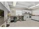 Well-equipped community kitchen with ample counter space at 9945 47Th N Ave # 110, St Petersburg, FL 33708