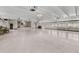 Large community room with a stage, perfect for events at 9945 47Th N Ave # 110, St Petersburg, FL 33708