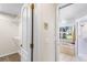 Bathroom with a walk-in shower, soaking tub, and a view of the yard at 23338 Duchess Ave, Port Charlotte, FL 33954