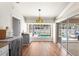 Dining area showcases natural light and views of the backyard pool for a delightful dining experience at 23338 Duchess Ave, Port Charlotte, FL 33954