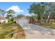 Charming single-story home with a well-manicured lawn and a two-car garage at 23338 Duchess Ave, Port Charlotte, FL 33954