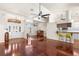 Spacious living room featuring high ceilings, hardwood floors, and natural light at 23338 Duchess Ave, Port Charlotte, FL 33954