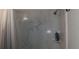 Shower with marble tile walls at 1345 Drew St # 1, Clearwater, FL 33755