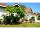 Single-story home with a red tile roof and well-maintained landscaping at 7801 Glascow Dr, New Port Richey, FL 34653