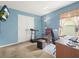 Home office featuring a desk and a rocking chair at 10507 Goldwater Ln, Riverview, FL 33569