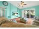 Spacious living room with hardwood floors, large windows, and comfortable seating at 10507 Goldwater Ln, Riverview, FL 33569