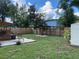 Spacious backyard with a large grassy area at 6704 N 13Th St, Tampa, FL 33604