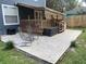 Concrete patio with deck and awning at 6704 N 13Th St, Tampa, FL 33604