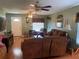 Spacious living area with hardwood floors and large windows at 6704 N 13Th St, Tampa, FL 33604