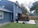 Two-story house with deck and fenced backyard at 6704 N 13Th St, Tampa, FL 33604