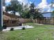 Large backyard with patio and wooden fence at 6704 N 13Th St, Tampa, FL 33604