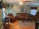 Living room with hardwood floors and comfortable seating at 6704 N 13Th St, Tampa, FL 33604