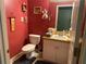 Small bathroom with toilet and vanity at 6704 N 13Th St, Tampa, FL 33604