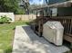 Spacious backyard patio with grilling station and hot tub at 6704 N 13Th St, Tampa, FL 33604