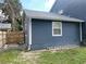 House exterior showcasing side view and ladder at 6704 N 13Th St, Tampa, FL 33604