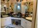 Large bathroom with double vanity and corner sinks at 6704 N 13Th St, Tampa, FL 33604