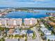 Modern home in a waterfront community with boat access at 116 Wimbledon Ct, Redington Shores, FL 33708